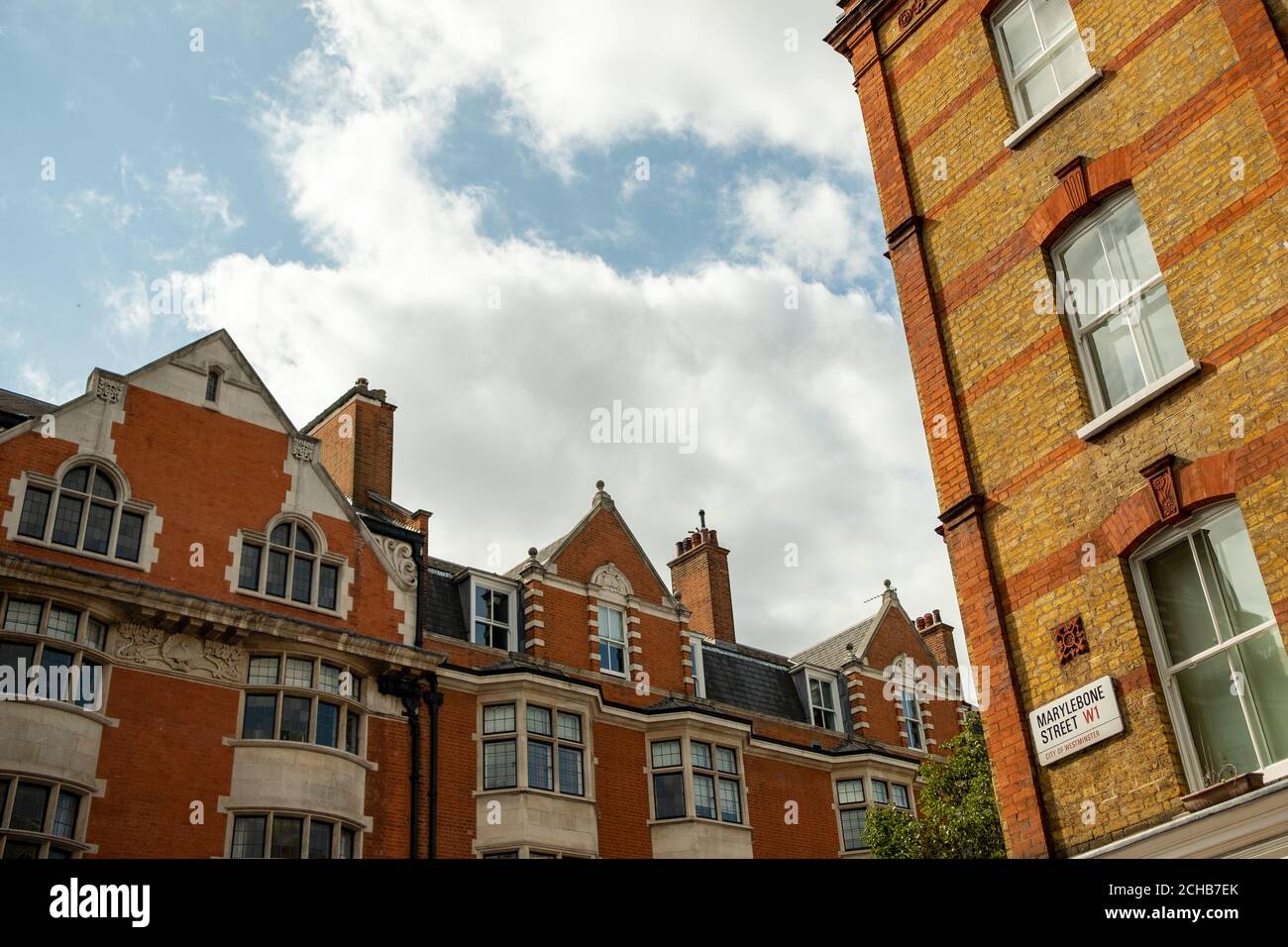 London - Luxury red brick mansion buildings in Marylebone Stock Photo