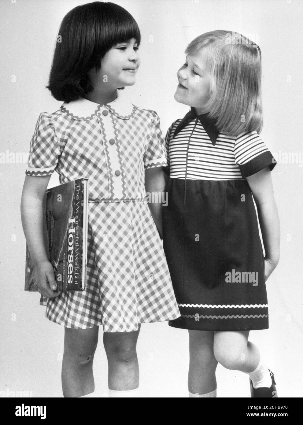School dresses from a collection at British Home Stores. Stock Photo