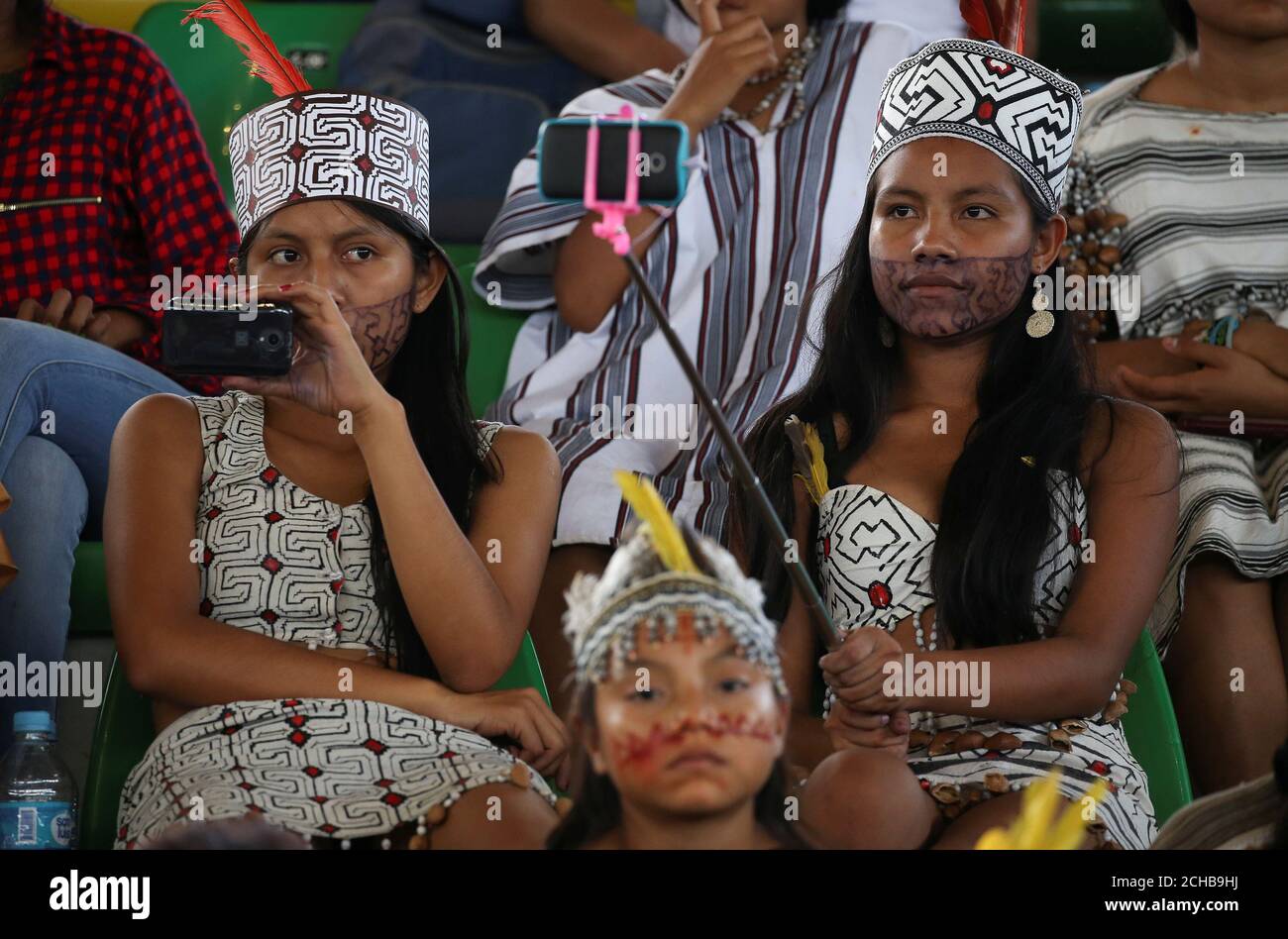 Members of an indigenous group from the Amazon region attend a meeting with Pope Francis at the Coliseo Regional Madre de Dios in Puerto Maldonado, Peru, January 19, 2018. REUTERS/Alessandro Bianchi Stock Photo