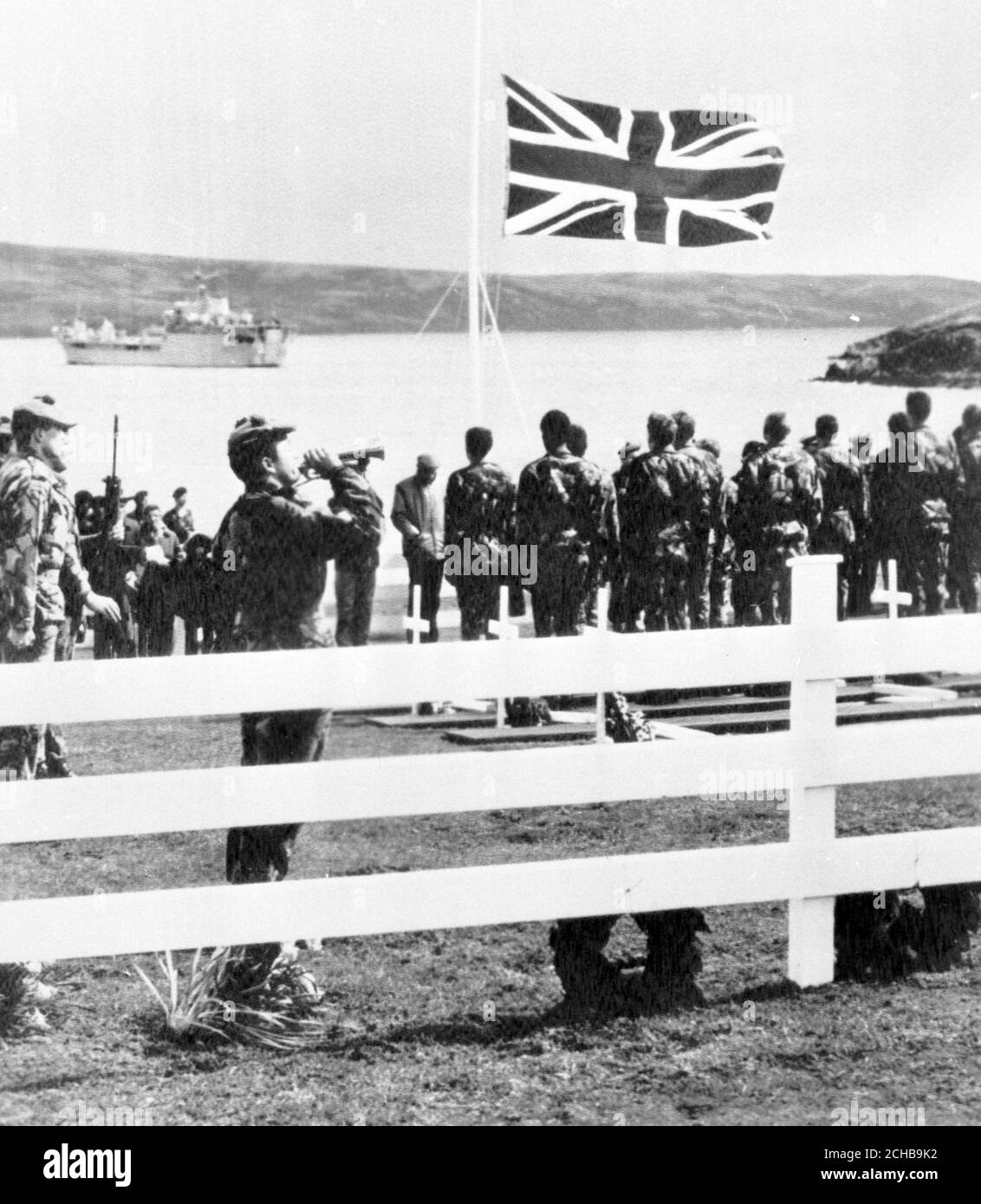 A Ministry of Defence picture released in London, which shows Private John Urquhart, 25, Queen's Own Highlanders, sounding the Last Post during the reburial ceremony at Blue Beach Military Cemetery, in Port San Carlos, of 14 men killed in the Falklands fighting. Stock Photo