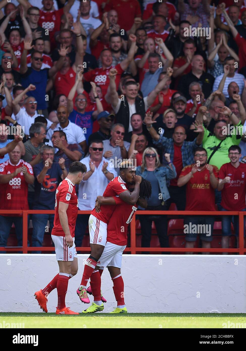 Nottingham Forest's Britt Assombalonga (centre) celebrates scoring his side's first goal. Stock Photo
