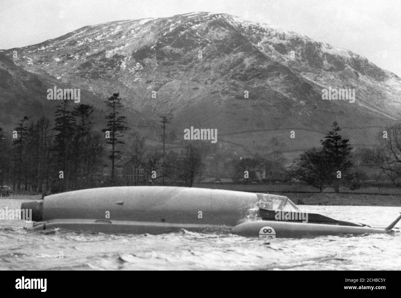 Donald Campbell's turbojet hydroplane Bluebird is driven today under her own power for the first time. Mr Campbell gently steered her around the lake at Ullswater at a few knots as part of his preparation for his attempt on the world water speed record. Stock Photo