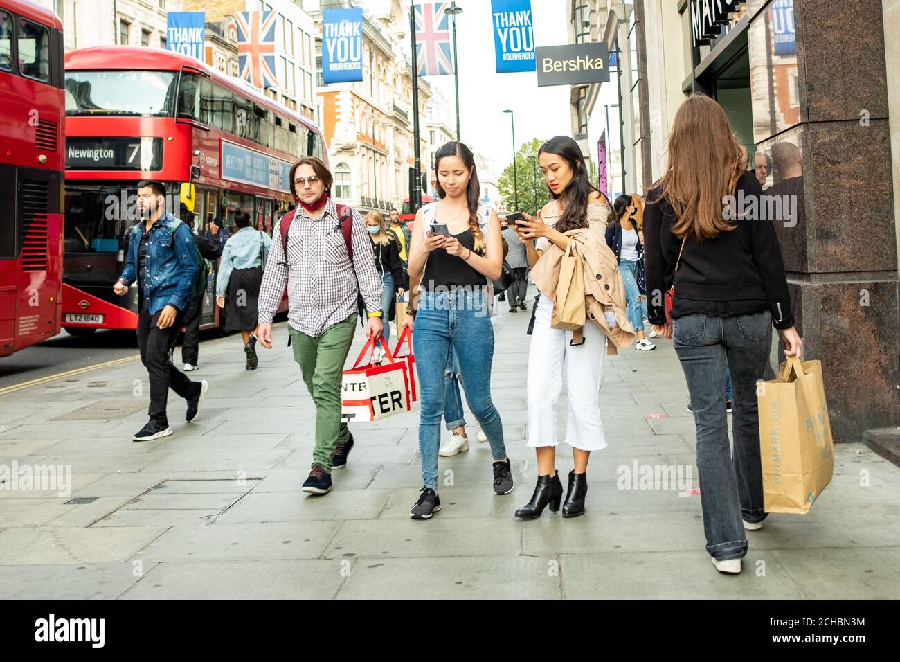London- September, 2020: People shopping on Oxford Street in the west end. A world famous London landmark and retail destination Stock Photo
