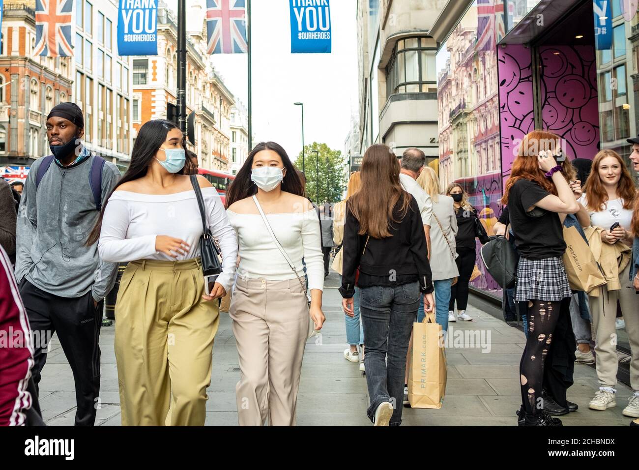 London- September, 2020: Shoppers on Oxford Street wearing Covid 19 face masks Stock Photo