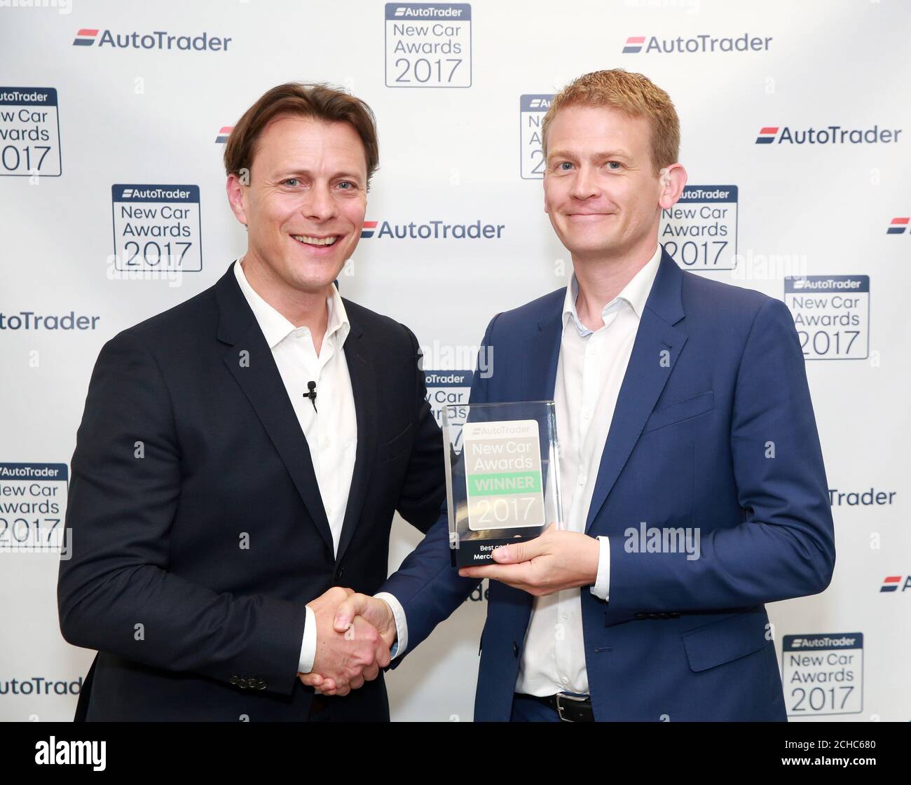 Rory Lumsdon of Mercedes-Benz (right) receives the awards for Best 