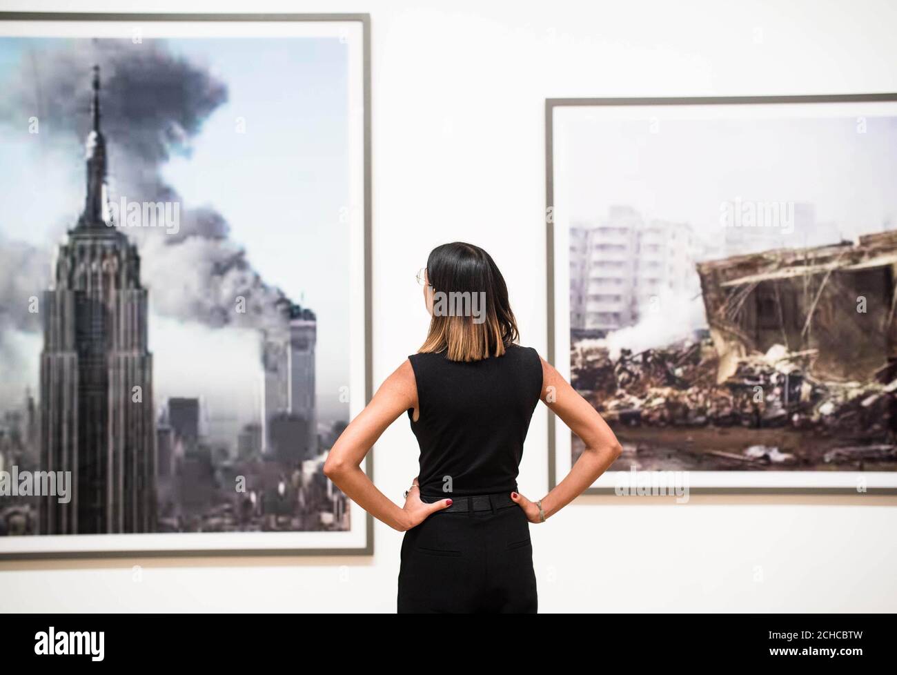 Gallery Staff Priya Shemar Looks At The jpeg Series By Artist Thomas 