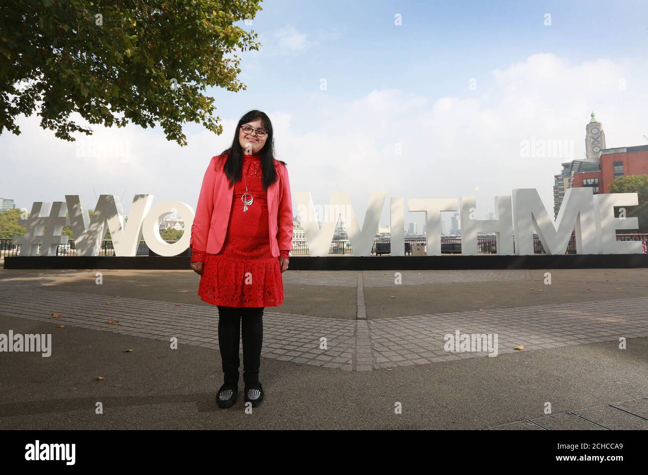 Campaigner Nusrat Patel, who has Downs Syndrome, launches the #WorkWithMe project with disability charity Scope and Virgin Media, on Londons Southbank. PRESS ASSOCIATION. Issue date: Thursday September 28, 2017. The flagship campaign aims to support one million disabled people into work by 2020, with the launch of a new digital employment support service for disabled people, funded by Virgin Media. Photo credit should read: Matt Alexander/PA Wire Stock Photo