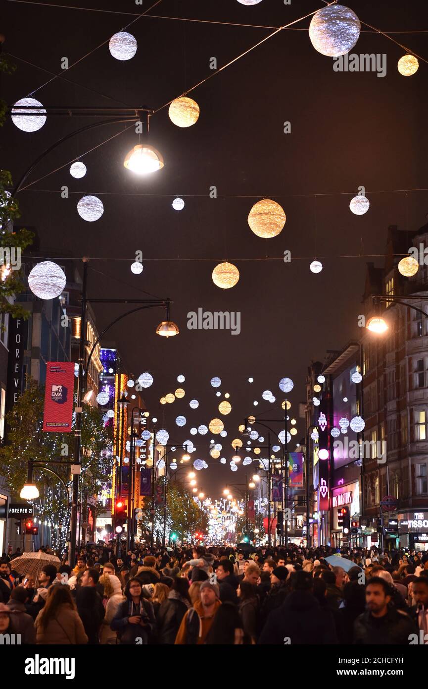 Crowds oxford street christmas lights switch on central london hires