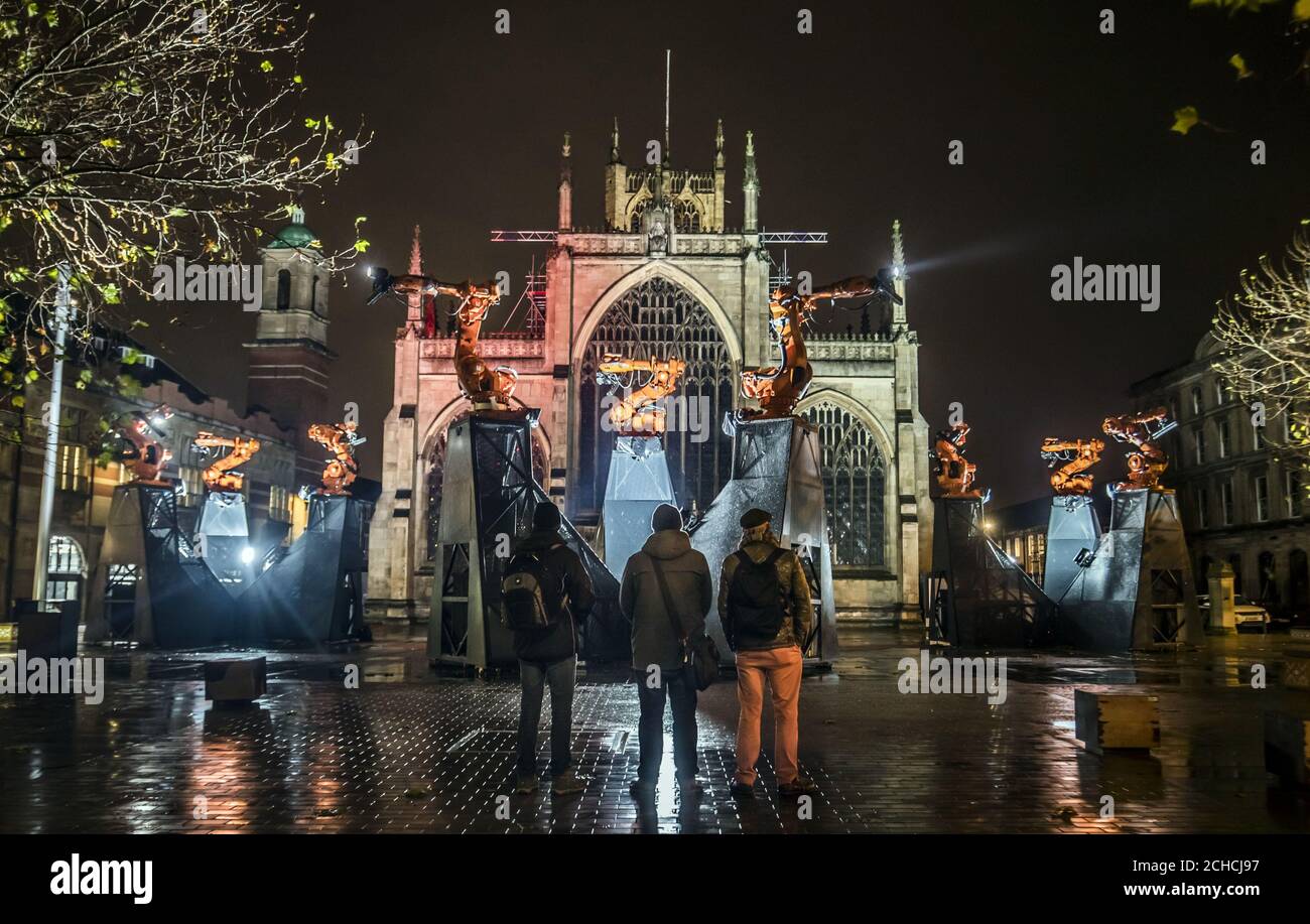 EDITORIAL USE ONLY Members of the public view Jason Bruges Studio's kinetic installation, titled Where Do We Go From Here?, which has gone on display in Hull. The artwork featuring robotics, light and sound is the last major art commission for Hull UK City of Culture 2017. Stock Photo