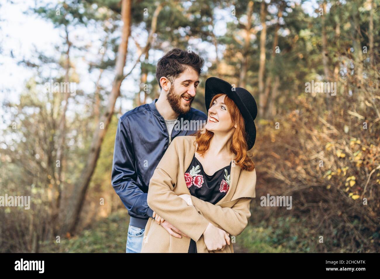 Happy young romantic couple spend time together outdoor Stock Photo - Alamy