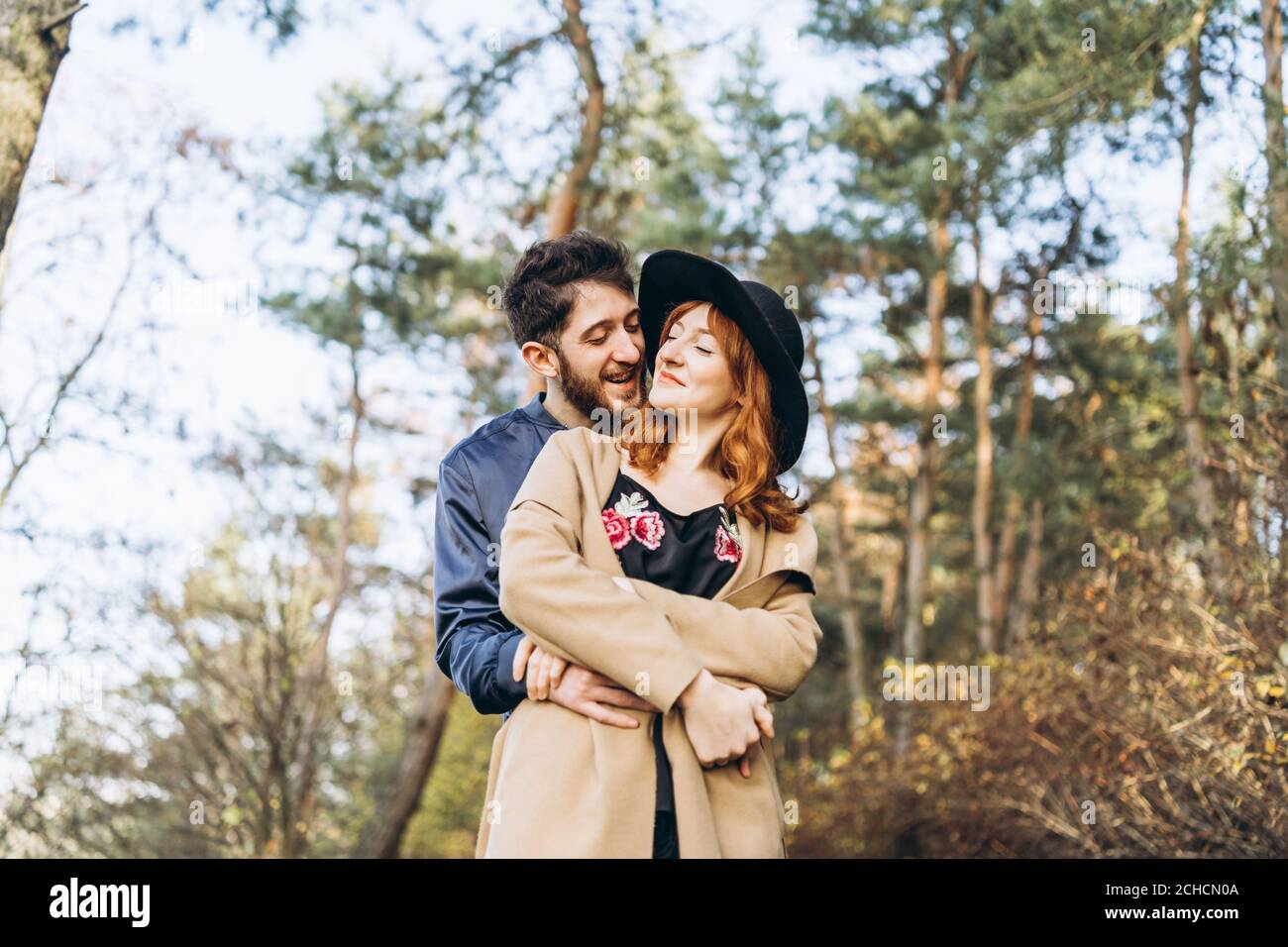 Happy young romantic couple spend time together outdoor Stock Photo - Alamy