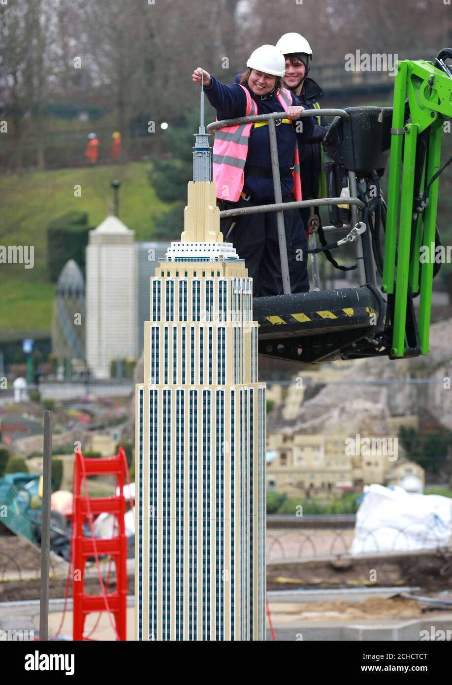 EDITORIAL USE ONLY Model makers Paula Laughton and Tim McPhee put the  finishing touches to a new LEGO Empire State Building, which has 71,040  bricks and took 700 hours to build, at