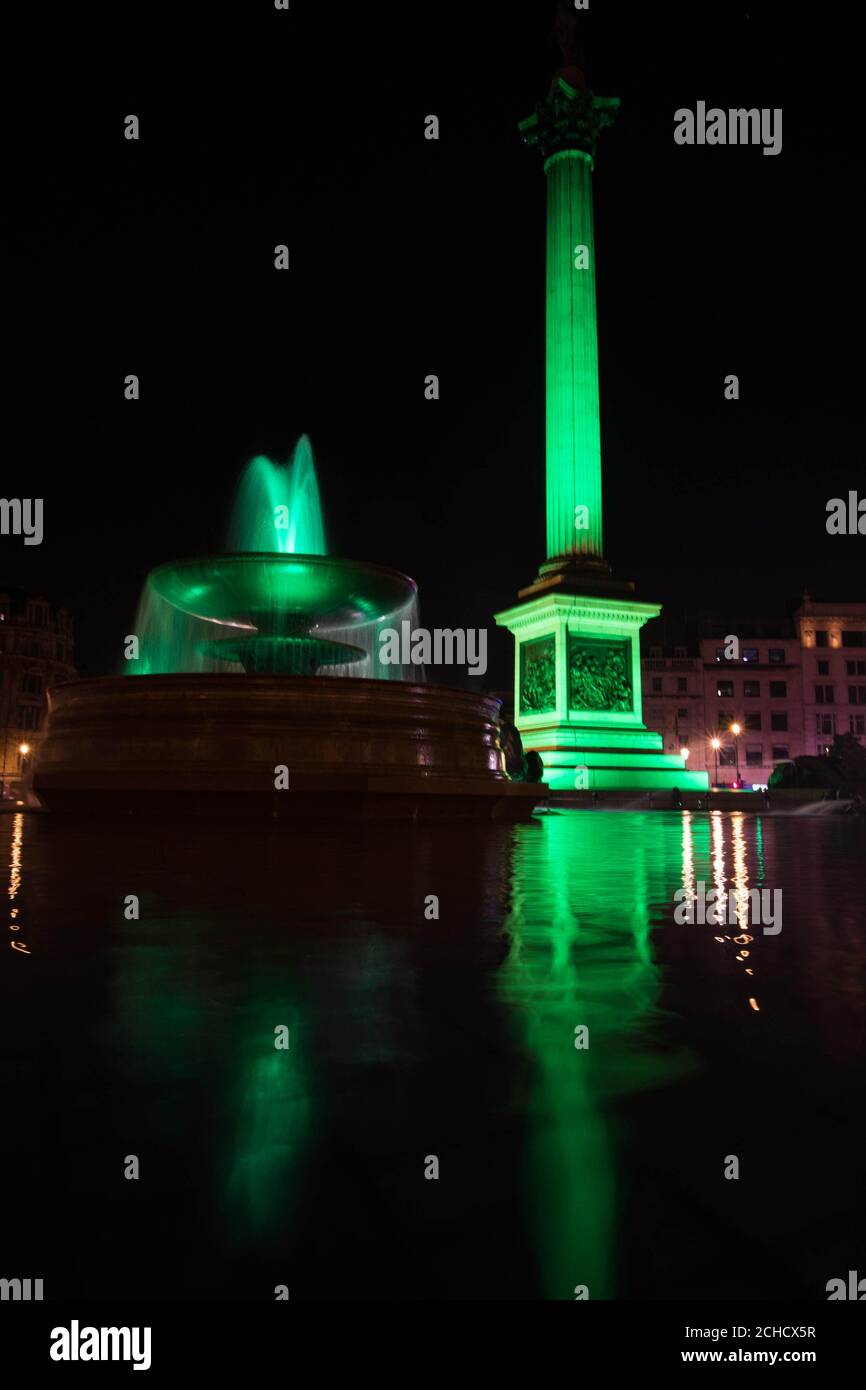 EMBARGOED TO 0001 FRIDAY MARCH 16 EDITORIAL USE ONLY Nelson's Column and the fountain in London's Trafalgar Square are illuminated green by Tourism Ireland to mark St Patrick's Day, which is this Saturday.  Stock Photo