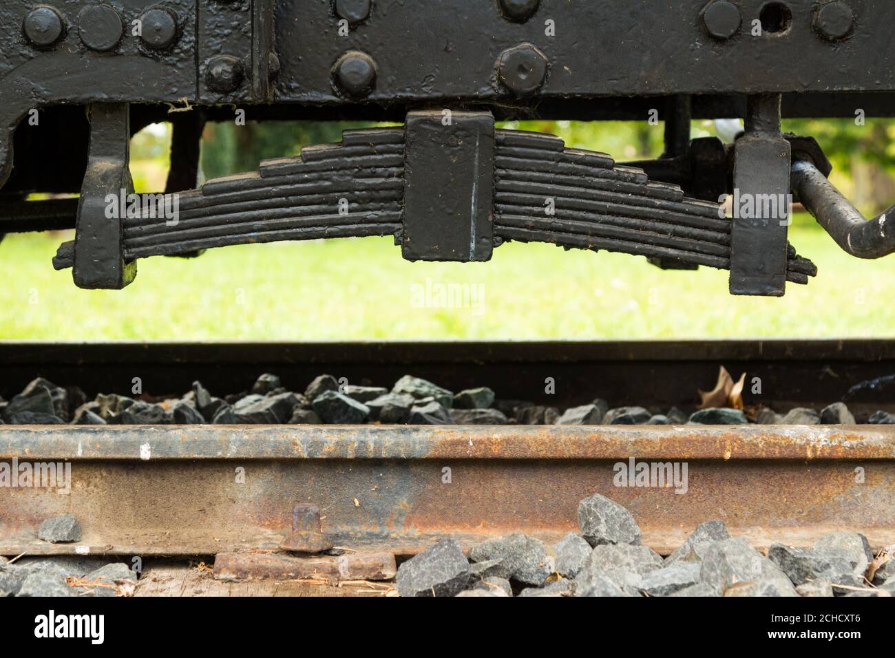 Leaf spring of an old narrow-gauge railway car wagon exhibited in Nagycenk, Hungary Stock Photo