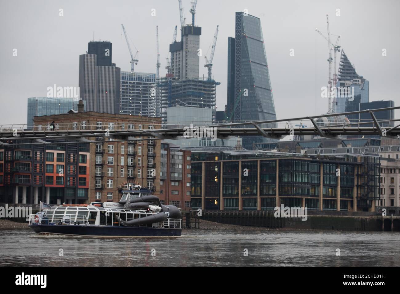 A 'giant sea creature' that has attached itself to the Golden Star passenger boat on the Thames in central London, as Kraken Rum ask the public to register sightings with videos and photos using hashtag #ReleaseTheKraken. Stock Photo