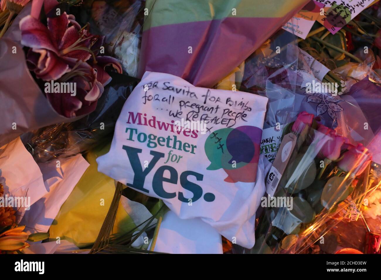 Candle and flowers are placed in front of a mural of Savita Halappanavar called aches in Dublin as Ireland has voted to repeal the 8th Amendment of the Irish Constitution which prohibits abortions unless a mother's life is in danger. Stock Photo