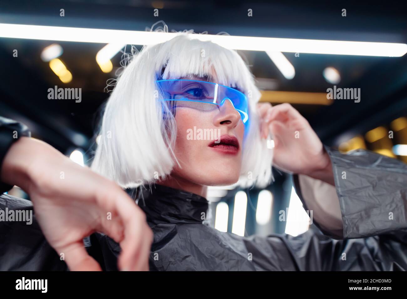 Female futuristic portrait. Woman in cyber glasses. Stock Photo