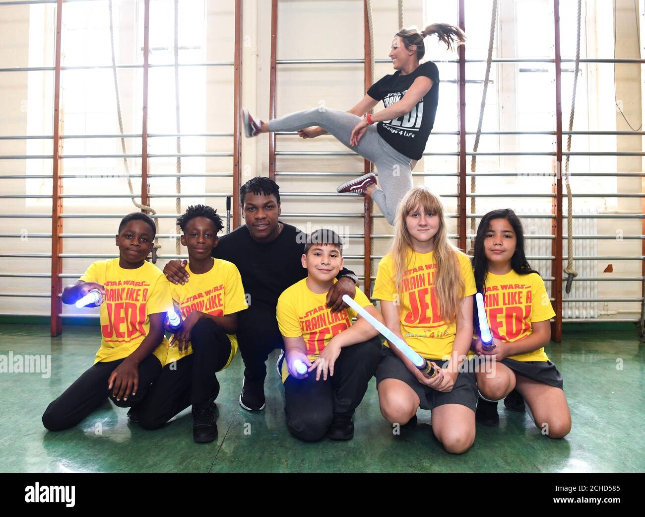 John Boyega visits his old primary school, Oliver Goldsmith Primary School in London, alongside British taekwondo double Olympic gold medalist Jade Jones to support the new Change4Life Train Like A Jedi programme from Public Health England and Disney UK, which is designed to tackle low levels of physical activity amongst children in England. Stock Photo