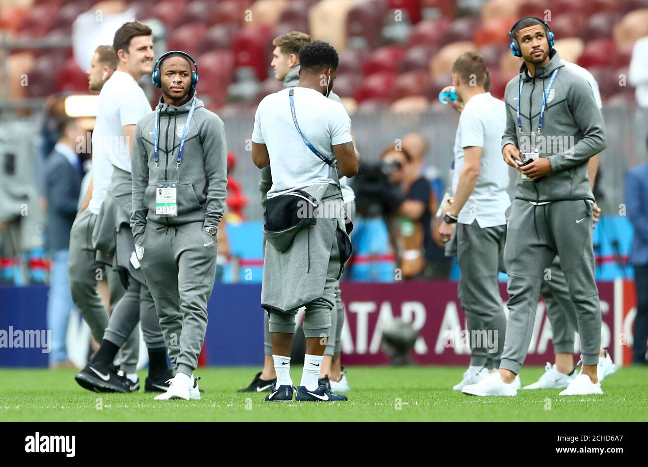 England's Raheem Sterling (left) and team mates inspect the pitch ahead of the FIFA World Cup, Semi Final match at the Luzhniki Stadium, Moscow. Stock Photo