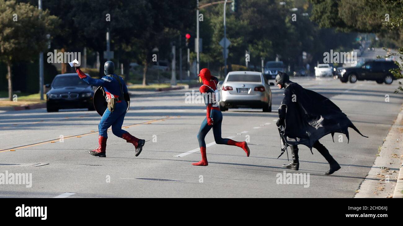People Dressed Like Comic Book Characters Captain America Spider Man And Batman Run Across The Street In Pasadena California U S August 27 16 Picture Taken August 27 16 Reuters Mario Anzuoni Stock Photo Alamy