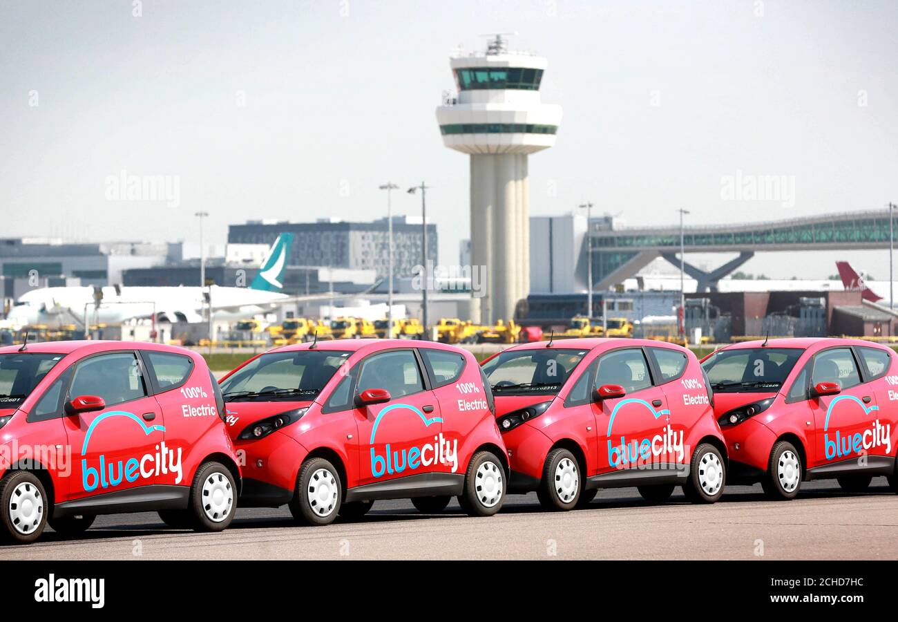 Ten electric cars at Gatwick South Terminal as Bluecity launch their zero emissions car sharing scheme &Atilde; a first for a UK airport. Stock Photo
