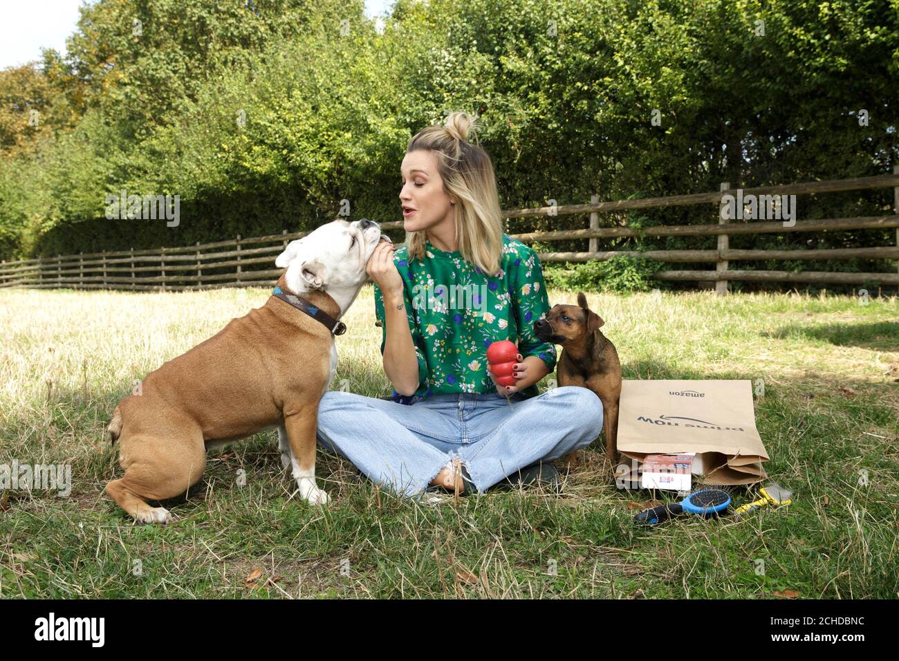 Ashley Roberts during her visit to Mudchute Farm in London to announce her role as head judge of the 'Face of Amazon Pets', a competition which will see one the winning pet awarded the top prize of a £1,500 gift card and a professional photo and video shoot. Stock Photo