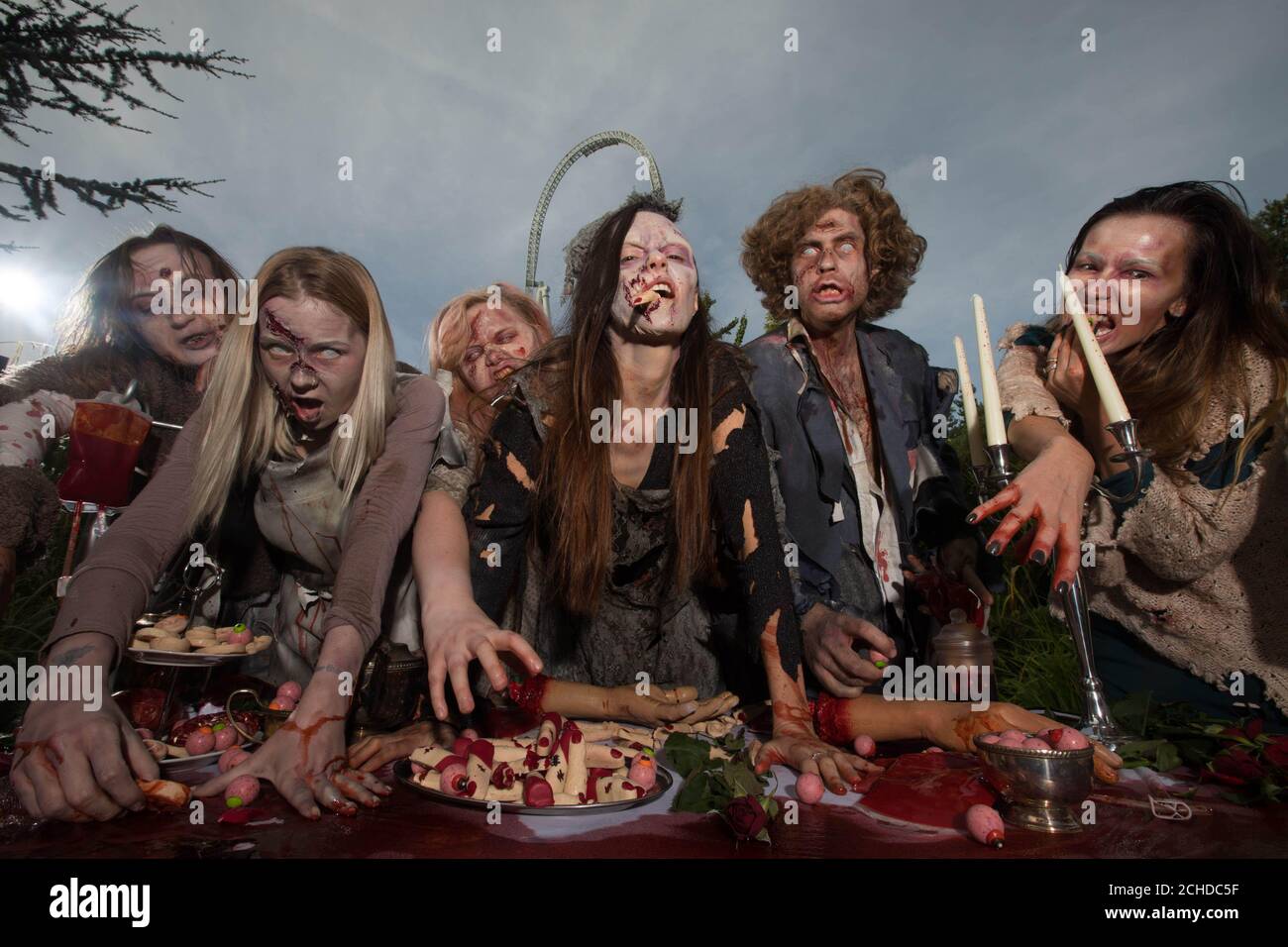 EDITORIAL USE ONLY Hollyoaks actress Jennifer Metcalfe (centre) dresses as a 'zombie' for a gory feast at THORPE PARK Resort, Chertsey to mark the arrival of six new live action scare mazes and horror zones for this year's FRIGHT NIGHTS season.  Stock Photo