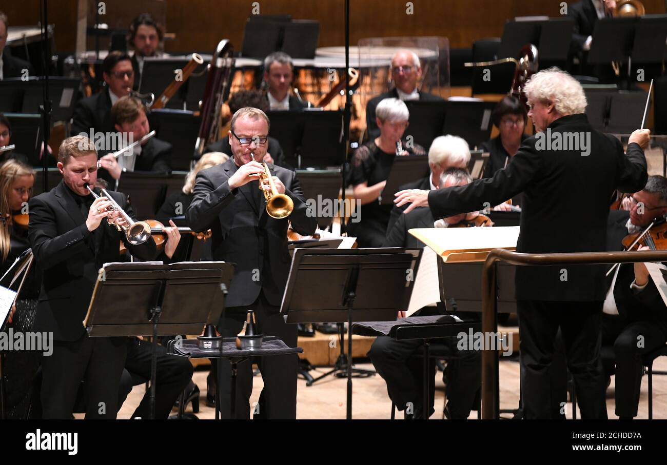 Sir Simon Rattle conducts the London Symphony Orchestra at the Barbican Hall in London, opening the orchestra's 2018/19 season. Stock Photo