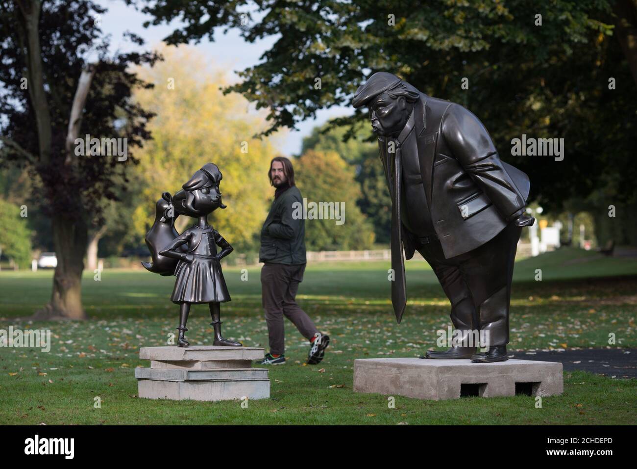 A statue of Roald Dahl's Matilda is unveiled in Great Missenden in Buckinghamshire, alongside one of President Donald Trump, to celebrate the 30th Anniversary of Matilda the novel. Stock Photo