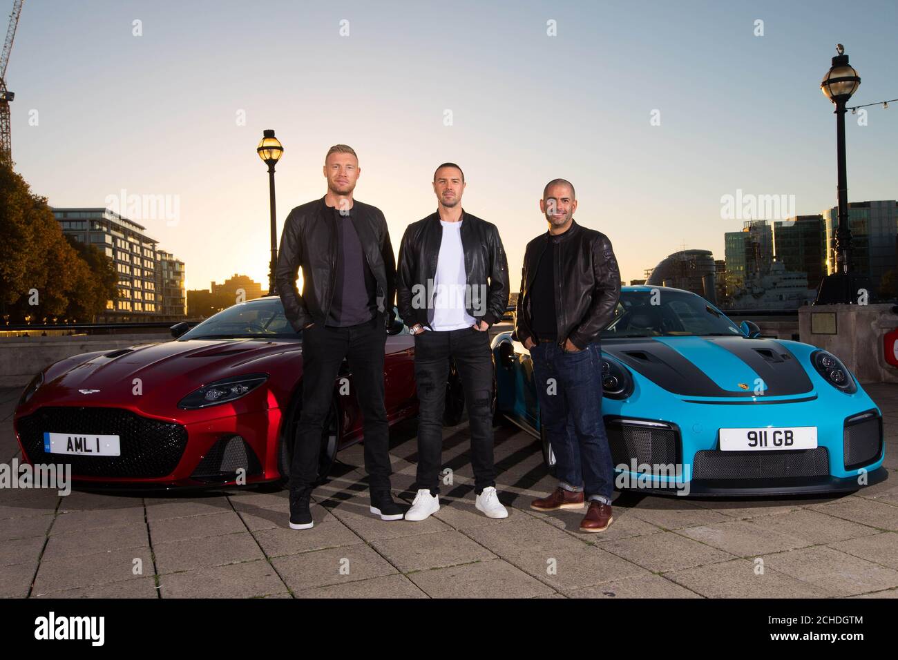 Left to right) Andrew 'Freddie' Paddy McGuinness and Chris Harris with an Aston Martin DBS Superleggera and a Porsche 911 GT2 at Billingsgate Market, London as they are revealed as
