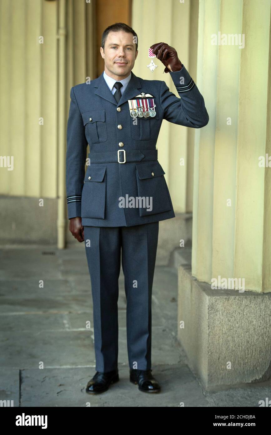 Flight Lieutenant Ben Wallis, Royal Air Force, after receiving the Air Force Cross for saving his aircraft and crew following the failure of all three engines on his Merlin helicopter, in an Investiture ceremony at Buckingham Palace, London. Stock Photo