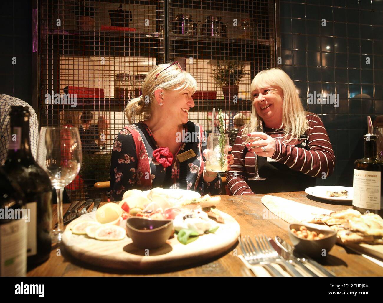 EDITORIAL USE ONLY Local councillor Jo Broom (left) attends the official reopening of Zizzi's Salisbury restaurant, eight months after it was caught up in the poisoning of a former Russian intelligence officer and his daughter. Stock Photo