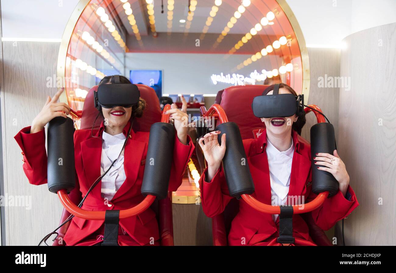 Editorial Use Only Left To Right Staff Members Nadya Al Dibaj And Anne Marie Moles Try Out The Virtual Rollercoaster At The Opening Of New Virgin Holidays Flagship V Room Store Which Becomes The First