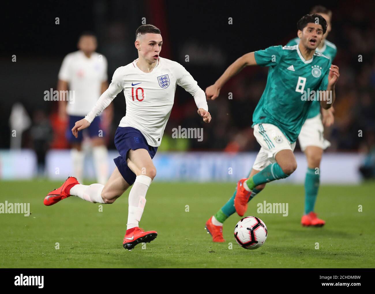 Soccer Football - Under 21 International Friendly - England v Germany - The Vitality Stadium, Bournemouth, Britain - March 26, 2019  England's Phil Foden in action with Germany's Mahmoud Dahoud      Action Images via Reuters/Peter Cziborra Stock Photo