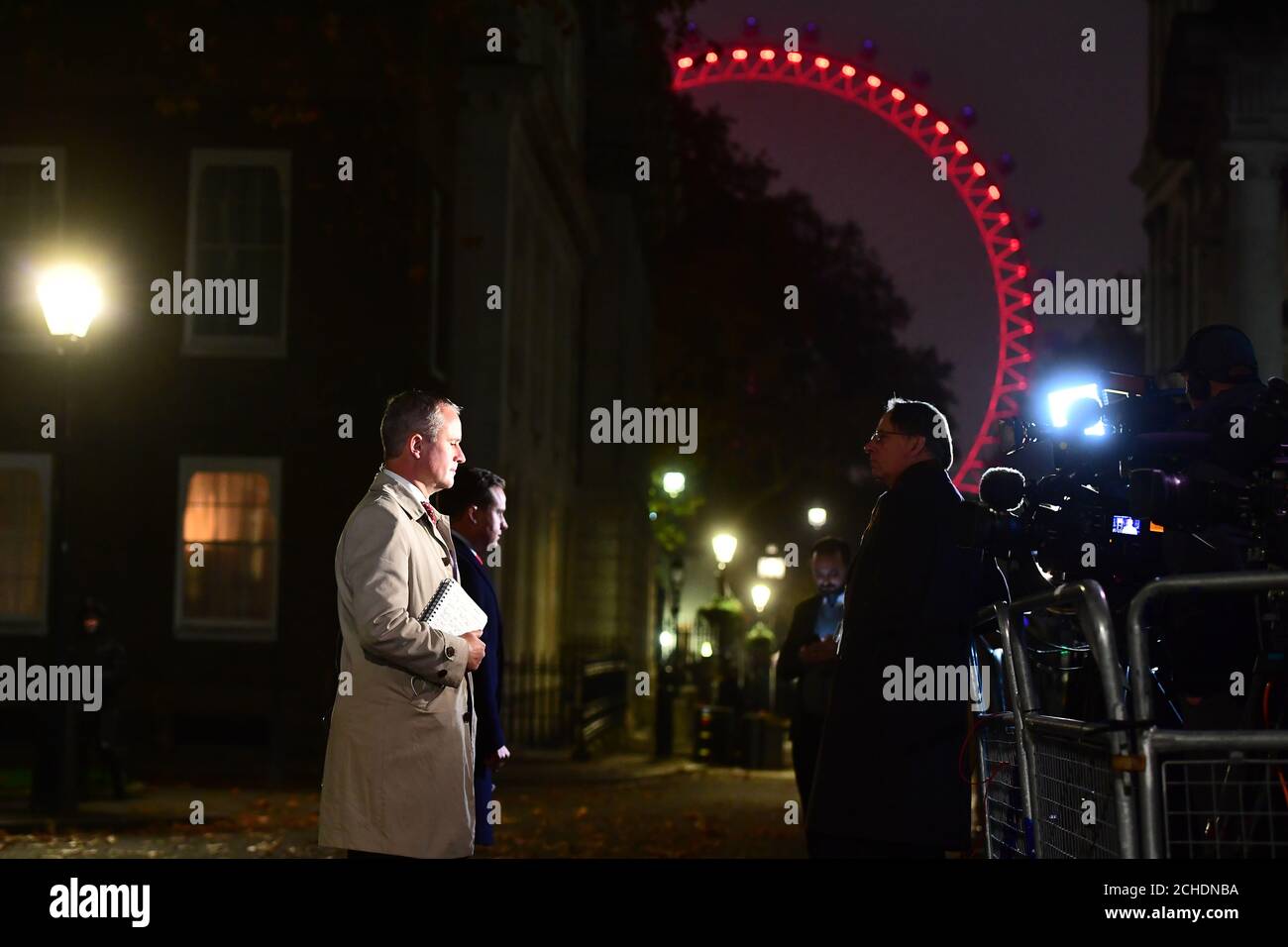 Reporters including Channel 4 News political correspondent Michael Crick (right) in Downing Street, London following a press conference given by the Prime Minister. Stock Photo