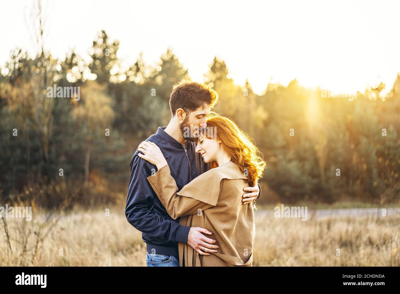Pretty young romantic couple spend time together outdoor Stock Photo ...