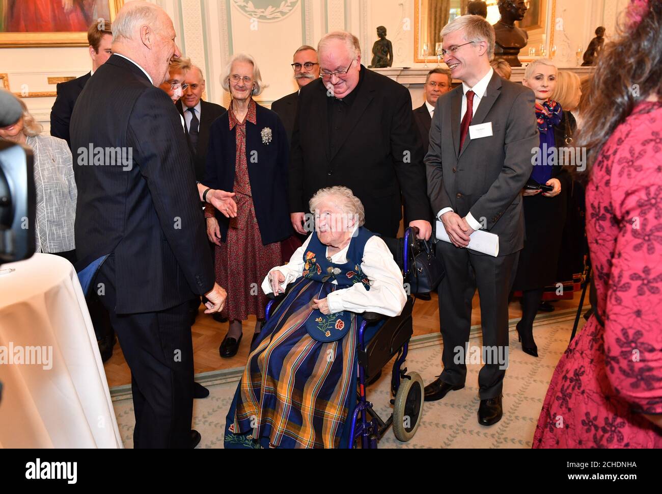 King Harald V of Norway meets guests at the Anglo-Norse Society ...