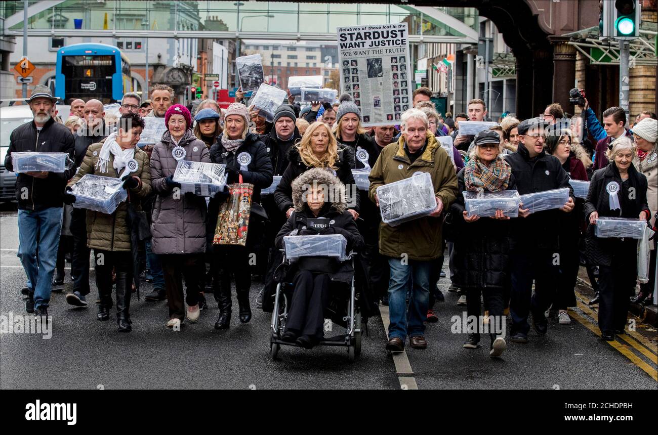 Christine Keegan (in wheelchair), whose daughters Mary and Martina were among the 48 victims of the Stardust nightclub fire, leads victims' families along Westland Row in Dublin to the Office of the Attorney General. 48,000 signed cards were delivered to the Attorney General's office calling for a fresh inquest into the fire on Valentine's Day 1981 that claimed 48 lives. Stock Photo