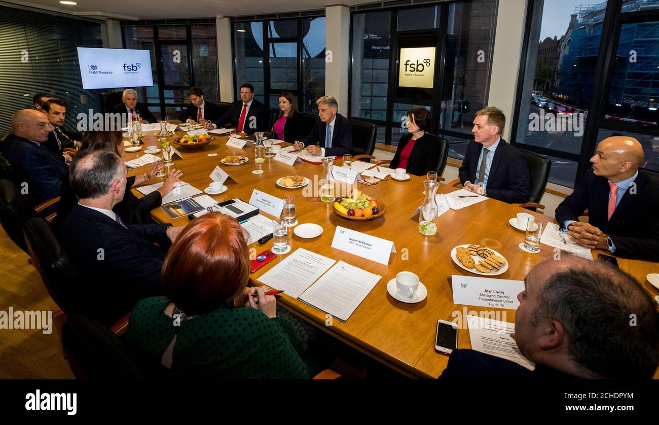 Chancellor of the Exchequer Philip Hammond (centre) during a meeting with members of the FSB Export Group and other special guests in Belfast during his visit to Northern Ireland. PRESS ASSOCIATION See PA Story POLITICS Brexit Ulster. Date: Friday 23 November 2018. Picture credit should read: Liam McBurney/PAWire Stock Photo