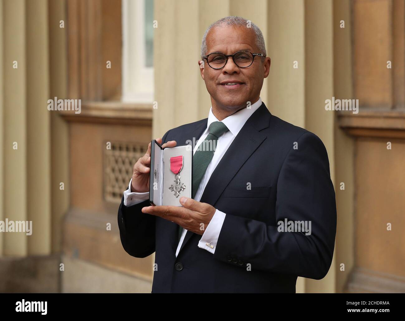Gary Wilmot with his MBE (Member of the Order of the British Empire), which was presented at an investiture ceremony at Buckingham Palace, London. Stock Photo