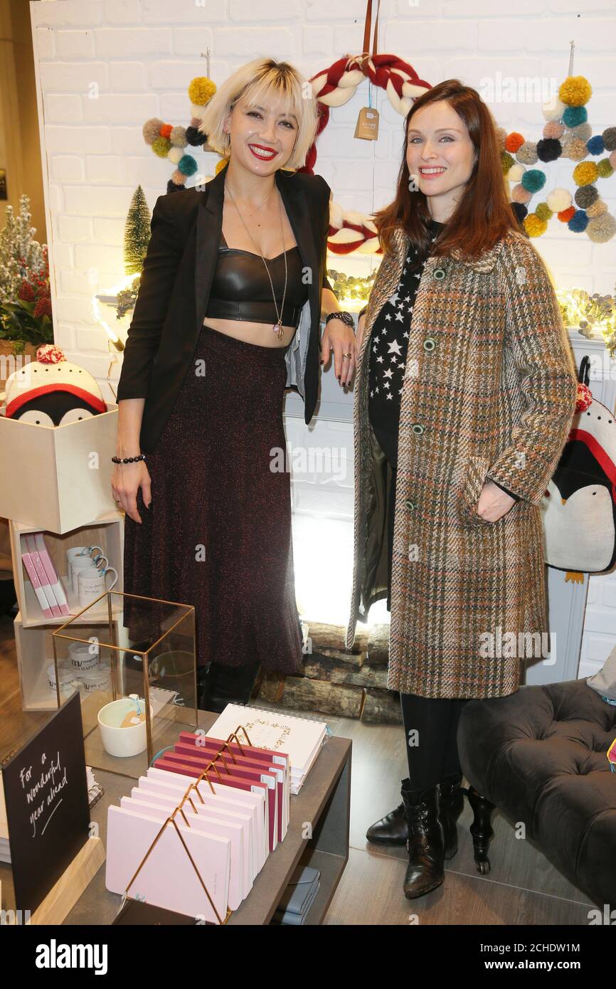 EDITORIAL USE ONLY (left to right) Daisy Lowe and Sophie Ellis-Bextor attend the launch of Not On The High Street Christmas pop-up at Westfield London in White City.  Stock Photo