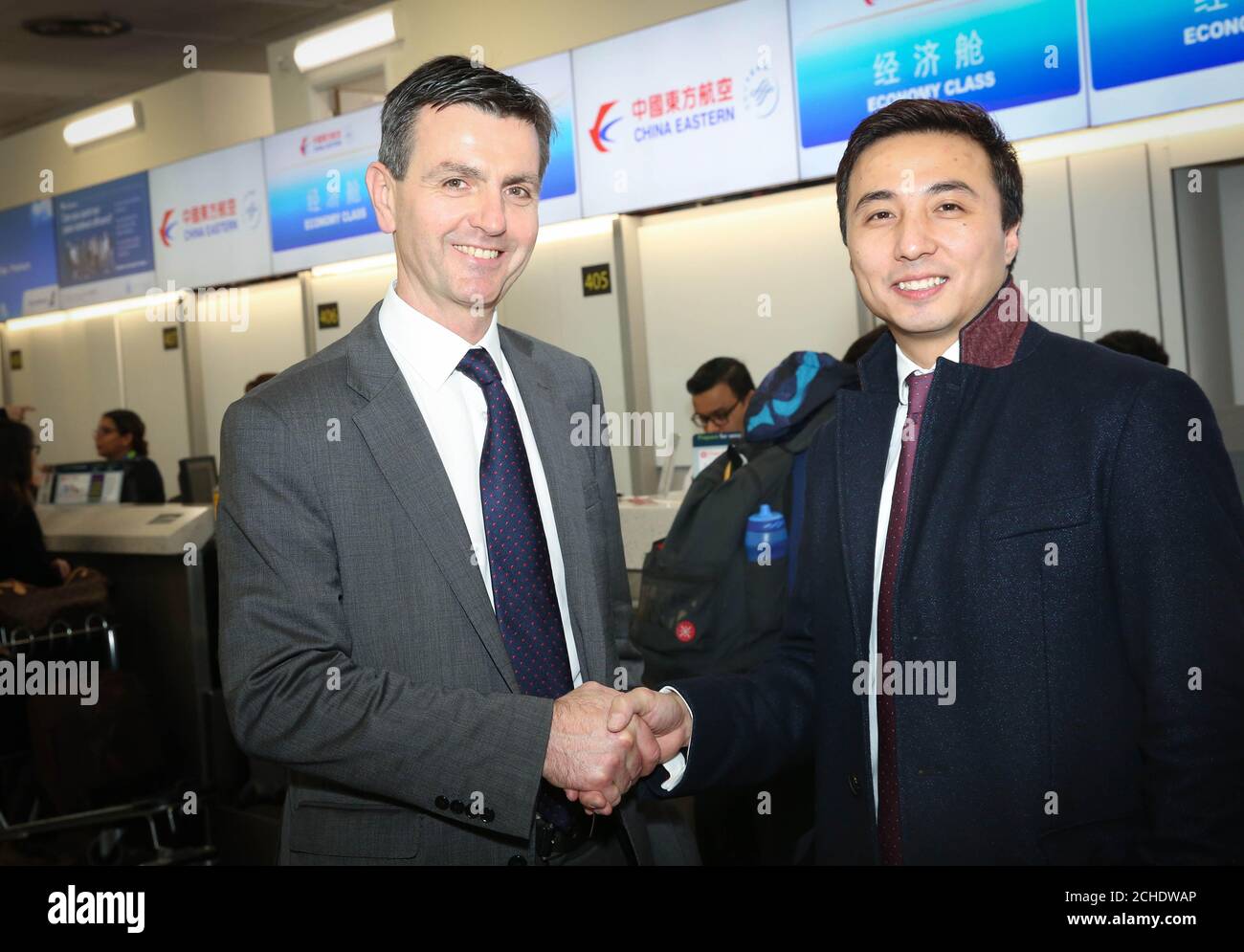 EDITORIAL USE ONLY Guy Stephenson, London Gatwick's Chief Commercial Officer, meets Kevin Li, General Manager UK &amp; Ireland at China Eastern, as the airline celebrates the launch of a vital new route from Gatwick to Shanghai.  Stock Photo