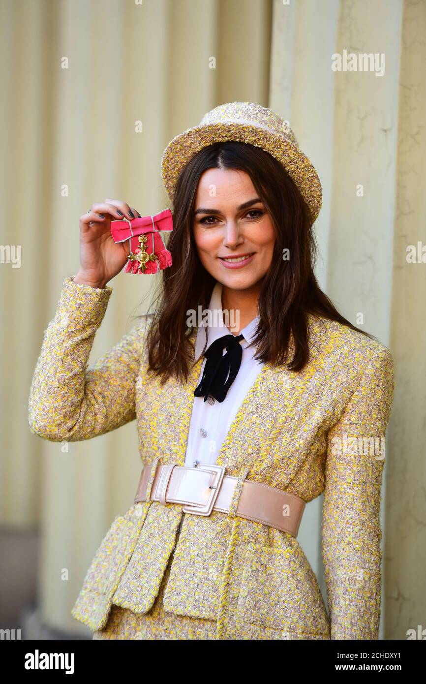 Keira Knightley with her OBE (Officer of the Order of the British Empire), which was presented at an investiture ceremony at Buckingham Palace, London. Stock Photo