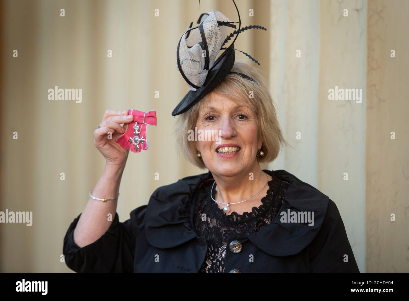 Margaret McCabe with her MBE (Member of the Order of the British Empire), which was presented at an investiture ceremony at Buckingham Palace, London. Stock Photo