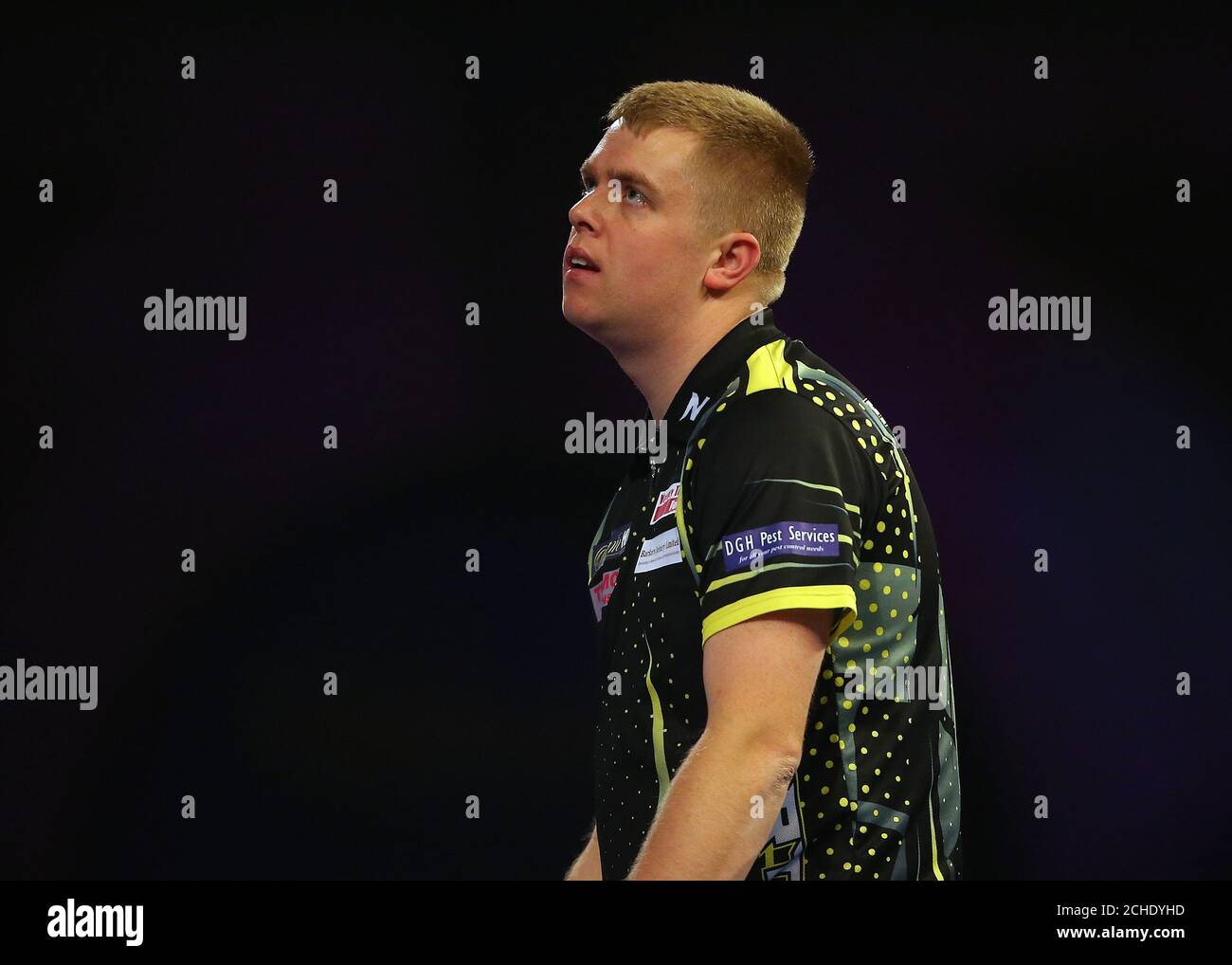 Stephen Burton reacts during his match against Ryan Searle during day three  of the William Hill World Darts Championships at Alexandra Palace, London  Stock Photo - Alamy