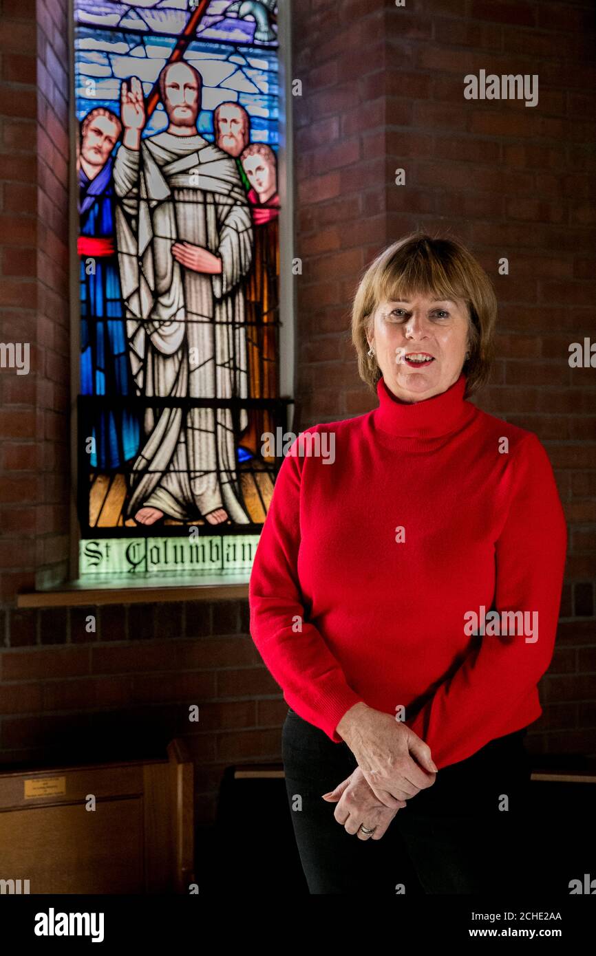 Deborah Girvan, President of the European Columban Way, by a stained