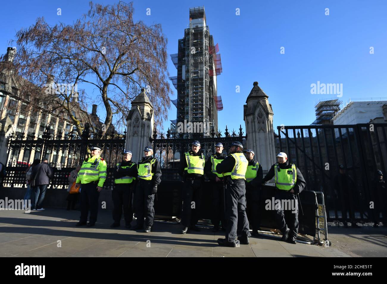 Metropolitan Police officers stand outside Parliament in London as police near Parliament have been 'briefed to intervene appropriately' if the law is broken after Tory MP Anna Soubry accused them of ignoring abuse hurled at politicians and journalists. Stock Photo