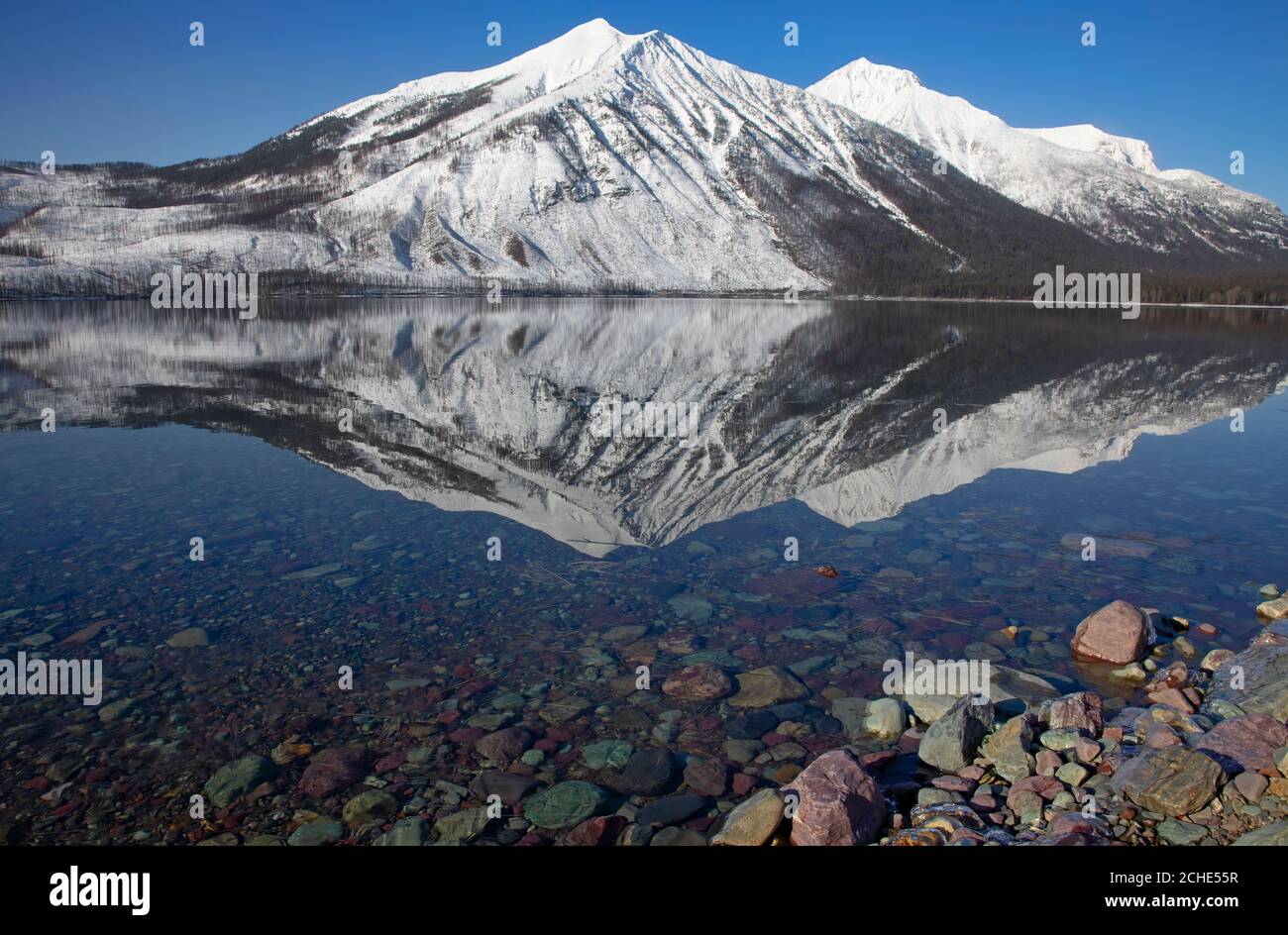 Stanton mountain on Lake McDonald reflection in Glacier National Park, Montana, USA Stock Photo