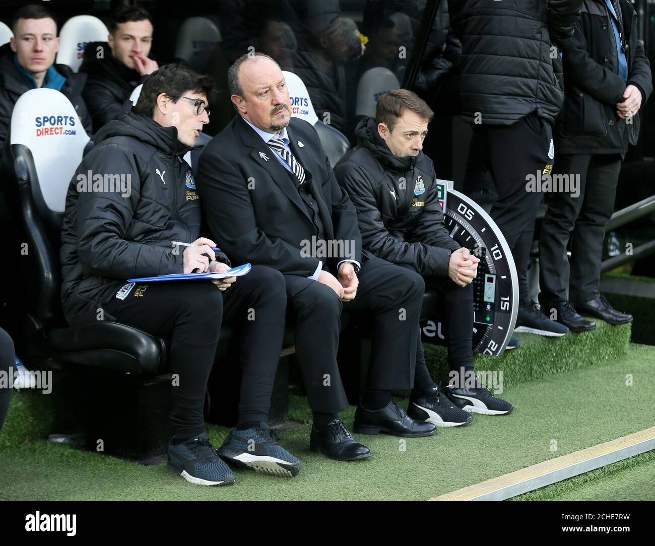 Newcastle United manager Rafael Benitez (right) with first team coach Mikel Antia (left) and assistant manager Francisco de Miguel Moreno before the Premier League match at St James' Park, Newcastle. Stock Photo