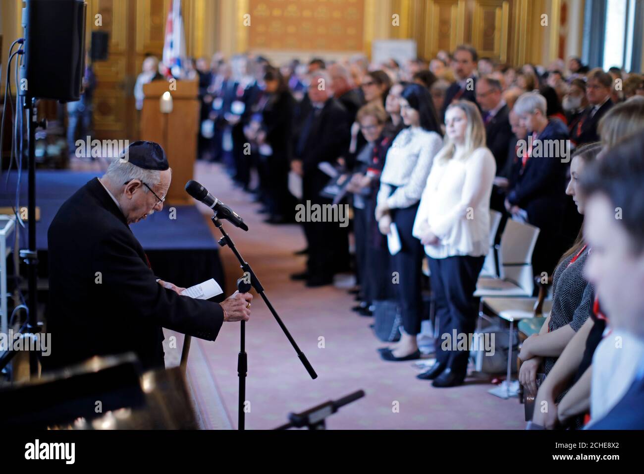 Rabbi Harry Jacobi sings to the audience at the annual Holocaust Memorial Day Commemoration event at the Foreign & Commonwealth Office, London. Stock Photo